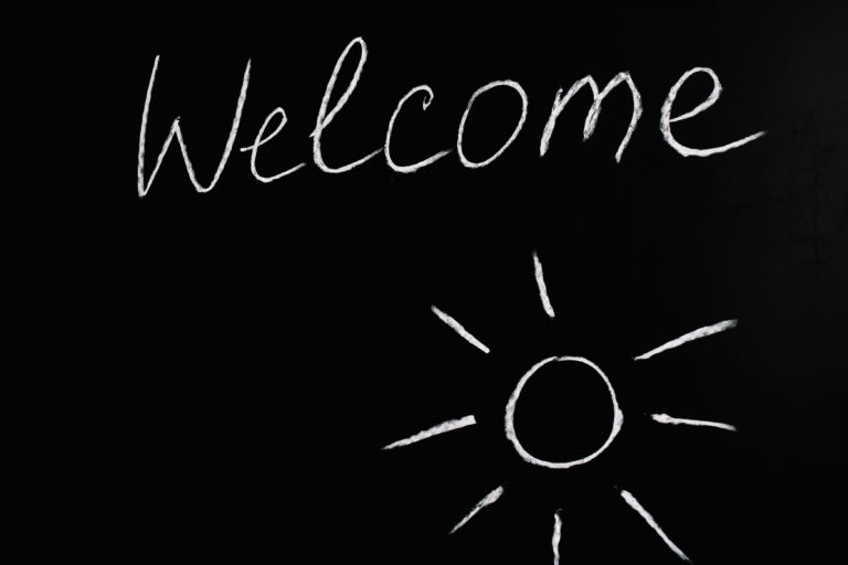 Welcome lettering text on black background